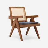 Lounge chair from the Punjab Engineering College, Chandigarh by Pierre Jeanneret, c. 1955, teak, cane, upholstery, sold Apr 2026