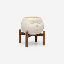 Johnson Tsang, Open Mind (Small), 2022, glazed earthenware, walnut