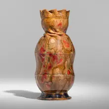 Fine and Tall vase by George E. Ohr, 1897-1900, glazed earthenware, sold Feb 2026