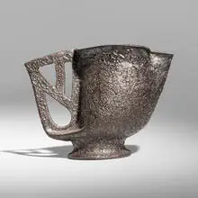 Pitcher by George E. Ohr, 1897-1900, glazed earthenware, sold Feb 2026