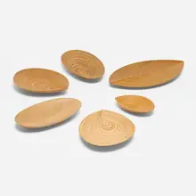 Tapio Wirkkala, Collection of six leaf trays, c. 1951, laminated birch, teak, and hazel wood