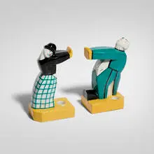 Robj, Clown push and pull bookends, pair, c. 1930, glazed and painted porcelain