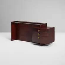 Gilbert Rohde, No. 3770 Group vanity, c. 1940, rosewood, brass, glass