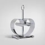 Norman Bel Geddes, Magazine rack, c. 1935, chrome-plated brass