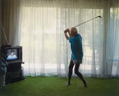 Practicing Golf Swing, aus der Serie „Pictures from Home“, 1983–1992 by Larry Sultan, 1986, C-Print, sold Jun 2021