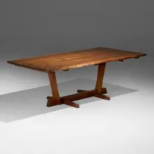 Exceptional special-order Conoid dining table by Mira Nakashima, 2011, Persian walnut, American black walnut rosewood, sold Jan 2026