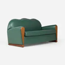 John Dunnigan, Exclamation Point sofa, c. 1985, chip-carved mahogany, leather upholstery