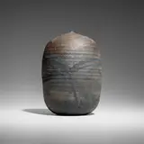 Closed Form (with rattle) by Toshiko Takaezu, c. 1985, glazed and raku-fired stoneware, sold Jan 2026