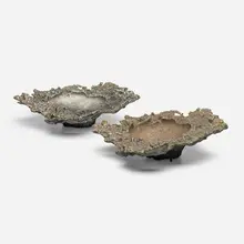 Freeform ashtrays, set of two by Paul Evans, c. 1965, cast and patinated bronze, cast and patinated aluminum, sold Jan 2026