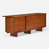 Triple Sliding Door cabinet by George Nakashima, 1962, American black walnut, sold Jan 2026