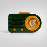Fada, Bullet radio, model 115, c. 1941, catalin, plastic, mesh, gilt metal