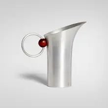 Russel Wright, Pitcher, c. 1932, walnut, spun aluminum