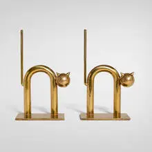 Cat bookends model 17042, pair by Walter von Nessen, c. 1930, brass-plated copper, sold Apr 2026
