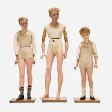 Pierre Imans, Boy mannequins, set of three, c. 1925, lacquered wax, hair, glass, porcelain, fabric, wood