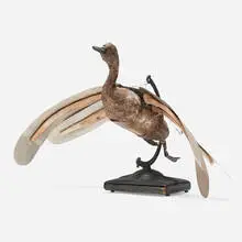 Ron Pippin, Untitled (Duck), aluminum, bone, painted plaster, wire and enameled steel globe stand, bound book