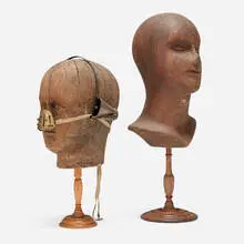 Тарас Порожняк, Medical contraptions on mannequin heads, c. 1895, wood, brass, leather, elastic ribbon