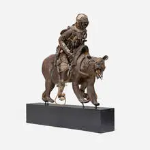 Ron Pippin, Figure riding bear, painted plaster and wood, feather, leather, bone, metal, mixed media assemblage