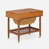 Ejvind A. Johansson, Sewing table, c. 1965, teak, walnut, rattan, casters