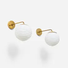 Wall lamps, pair by Lisa Johansson-Pape, c. 1951, molded glass, brass, sold Apr 2026