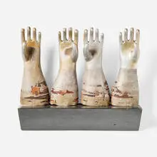 Vintage, Collection of four glove molds, c. 1950, aluminum, steel