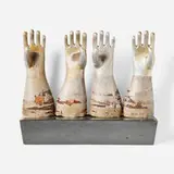 Vintage, Collection of four glove molds, c. 1950, aluminum, steel