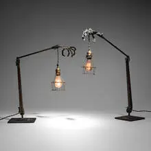 Machine Age, Table lamps with articulated robot hands, pair, c. 1950, steel