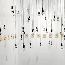 Diango Hernández, Fruits of Evil, 2006, light bulbs, electric cables, wire sockets, acrylic on paper