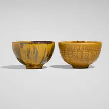 Tea bowls, set of two by Brother Thomas Bezanson, c. 2003, iron yellow-glazed porcelain, elm ash-glazed porcelain, sold Nov 2025