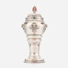 A. Dragsted, Covered vessel with cabochons and pineapple finial, 1909, silver, hardstone, coral, chrysoprase and garnet