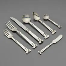 Héctor Aguilar, Aztec motif flatware service, c. 1950, sterling silver, stainless steel