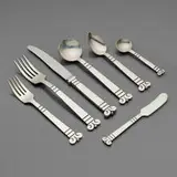 Héctor Aguilar, Aztec motif flatware service, c. 1950, sterling silver, stainless steel