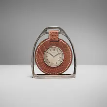 Stirrup desk clock by Paul Dupré-Lafon for Hermès, c. 1930, crocodile leather, chrome-plated brass, glass, sold Jun 2025