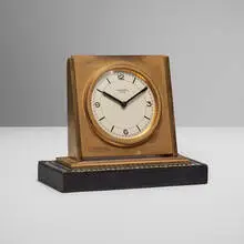 Table clock by Paul Dupré-Lafon for Hermès, c. 1935, gilt bronze, stitched leather, sold Jun 2025