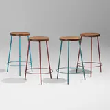 Stools from Chandigarh, set of four by Pierre Jeanneret, c. 1960, painted steel, teak, sold Sep 2025