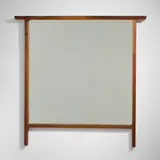 Wall-hanging mirror by George Nakashima, 1961, American black walnut, mirrored glass, sold Sep 2025