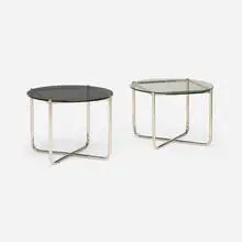 MR tables, set of two by Ludwig Mies van der Rohe, stainless steel, smoked glass, glass, sold Mar 2026
