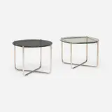 MR tables, set of two by Ludwig Mies van der Rohe, stainless steel, smoked glass, glass, sold Mar 2026