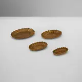 Tiffany Studios, Nesting trays, set of four, c. 1920, gilt bronze