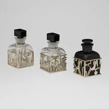 Karl Hagenauer, Collection of three perfume bottles, c. 1930, glass, nickel-plated brass
