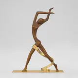 Dancer by Karl Hagenauer, c. 1950, carved wood, brass, sold Sep 2025