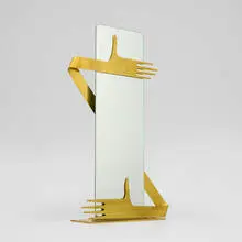 Mirror with arms by Franz Hagenauer, c. 1980, brass, mirrored glass, sold Sep 2025