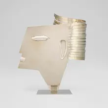 Man's Head by Franz Hagenauer, c. 1982, nickel-plated brass, sold Sep 2025