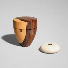 Dale Chase, Lidded vessels, set of two, c. 2000, ziricote, ivorine, gilt metal