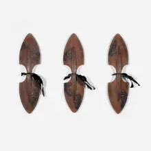 Susan Edgerley, Spine VII (from the Seed Sowers series), 1998, sandcast glass, patinated copper, wood