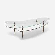 Tiered coffee table by Modern, c. 1955, glass, walnut, laminate, brass, painted wood, sold Mar 2026