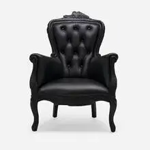 Where There's Smoke chair by Maarten Baas, 2002, charred wood, leather, sold Mar 2026