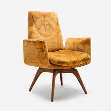 Swivel armchair by Vladimir Kagan, c. 1950, Jack Lenore Larsen Conquistador upholstery, walnut, sold Mar 2026