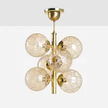 Chandelier by Modern, c. 1975, bullicante glass, brass, sold Mar 2026