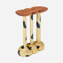 Table by Wendell Castle, 1988, walnut, painted redwood, sold Mar 2025