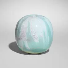 Vase by Brother Thomas Bezanson, c. 1984, turquoise blue and green copper-glazed porcelain, sold Aug 2025